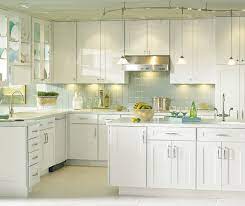 Beautiful granite counters and genuine stone mosaic backsplash. Thomasville Eden Maple White