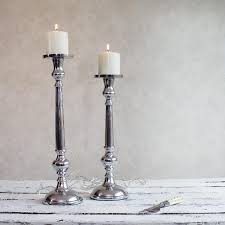 Electromagnetic candle holder in grey. Classic Silver Candle Holder Zaza Homes