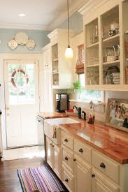 Select a few brightly colored blue shades to contrast a white wall and black cabinetry for a. Charming Ideas For Decorating Rustic Easily