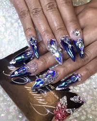 Beauty news music nails celebrity beauty cardi b normani kordei celebrity nails nail art music videos manicure. You Ll Need Eclipse Glasses To See Cardi B S Latest Nail Art Nail Art Latest Nail Art Swarovski Nails