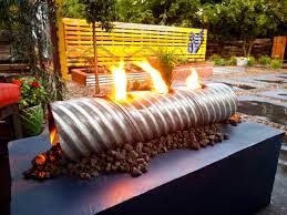 Candles can be placed inside in place of an actual fire for the same glowing ambiance. 66 Fire Pit And Outdoor Fireplace Ideas Diy Network Blog Made Remade Diy