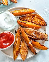Its flesh ranges from beige through white, red, pink, violet, yellow, orange, and purple. Crispy Baked Sweet Potato Wedges Healthy Fitness Meals