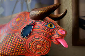 As time progresses, the melodies and light patterns of the alberijes change as a custom genetic algorithm treats the incoming sensor data. Red Bull Alebrijes Carving Buhl Photo