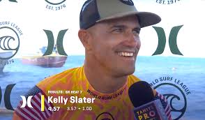 Tahiti Pro, Day one: "Kelly Slater was beautiful, brown, glowing bald head  protruding out of the day-glo jersey; Vaguely pornographic!"