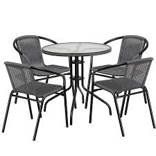 Hotels and resorts invest in commercial patio lounge sets for guests' comfort. Flash Furniture Rattan Round Patio Table Chair 5 Piece Set
