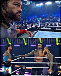 Roman Reigns and Jey Uso were not in the same team. The first picture is  Roman Reigns' expression as Jey Uso made his own entrance. He realized that  Jey had grown into