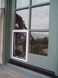 French Doors With Dog Door Leading To Dog Run On Deck Dog Door French Doors Diy Doggie Door