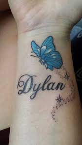Pin By Hollie Rosentreter On I Heart Tattoos Name Tattoos On Wrist Butterfly Wrist Tattoo Baby Name Tattoos