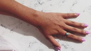 White Ink Tattoos On Dark Skin Fade Faster But There Are Other Ways To Get An Equally Stunning Effect Brown Tattoo Ink Ink Tattoo White Tattoo