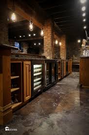 This transitional stem hung pendant comes with swivel canopy allows for installation on sloped ceilings. Basement Renovation Custom Bar Sustainable Solutions