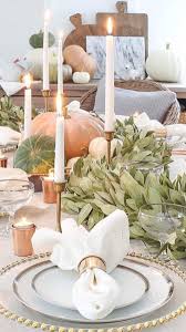 Beautiful Thanksgiving Table Setting In Gold And Copper Candles And Pumpkins War Thanksgiving Table Decorations Thanksgiving Table Settings Table Decorations