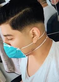 El corte de cabello medio desvanecido, el mid fade, ofrece un equilibrio perfecto entre una baja y alta decoloración. Mid Fade Comprimido Corte Like Home Barber Studio