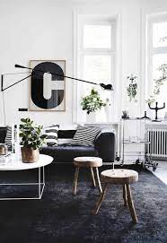 A Monochrome Apartment In Stockholm Filled With Clever Style Ideas Black Carpet Living Room Living Room Scandinavian Scandinavian Design Living Room