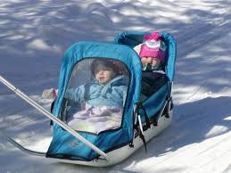 Pull Kids Behind You As You Cross Country Ski Pulk Sleds Enable Young Children To Join In The Fun Kids Kids Skis Winter Sleds