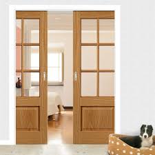 Double Pocket Dove 6 Pane Oak Sliding Door System In Three Size Widths With Clear Glass Roomdivide Sliding Pocket Doors Doors Interior Sliding Doors Interior
