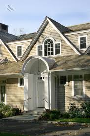Shingle Style Home With Barrel Vaulted Portico Smirosarchitects Smiros Shinglestyle Barrelvaulted Portico Shingle Style Homes Shingle Style House Styles