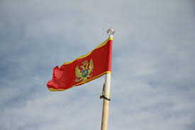 Застава црне горе / zastava crne gore) was officially adopted with the law on the state symbols and the statehood day of montenegro on 13 july 2004 at. Montenegro Flag Sky Free Photo On Pixabay