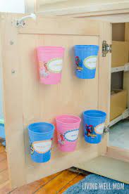 Add new new shelf and drawer liners and any organizers you need to help corral your supplies. Organize Toothbrushes And Toothpaste Out Of Sight
