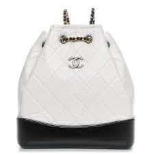Free shipping & exchanges, and a 100% price guarantee! Chanel Aged Calfskin Quilted Small Gabrielle Backpack Black White 211108 Fashionphile