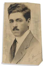 Curly's brother Jack, Moe's son Paul, Jack's second wife Marie, Curly, (of  course) and Jack's son Norman It was taken at Curly's Ledge Street home in  1944