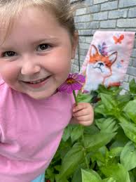 Daughter proud of growing seeds
