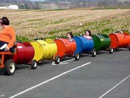 Stella And Ashima On The Barrel Train Barrel Train Kids Play Equipment Kids Wagon