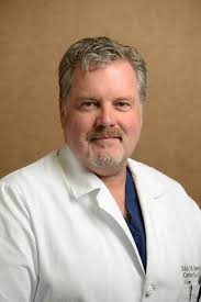 Dr. John M. Henry Obituary