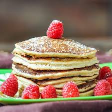 A Stack Of Biggest Loser Pancakes Surrounded By Fresh Raspberries Biggest Loser Pancakes Biggest Loser Recipes Food