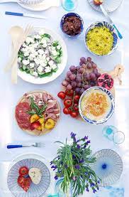Yogurt and tahini make a creamy dressing, while kalamata olives and feta cheese add their own distinctly greek flavors to the party. A Mediterranean Inspired Party Party Ideas Party Printables Blog