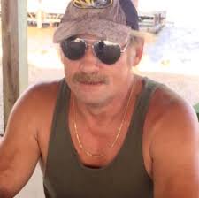 What is the part number for the piece between the bumper and lights/grill  for a '92-96 Ford F-Series OBS Truck?