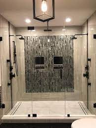 Completely Frameless Shower Enclosure With Flat Black Hardware Frameless Shower Enclosures Frameless Shower Doors Shower Doors