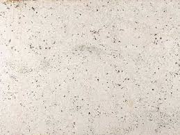 It has black and maroon spots uniformly splattered throughout the stone. Colonial White Granite Coast To Coast Kitchen Bath