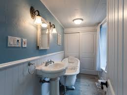 This tiny bathroom is made to feel much larger by the inclusion of mirror all around the room. Country Bathroom Ideas Departure From Minimalism Bella Bathrooms Blogs
