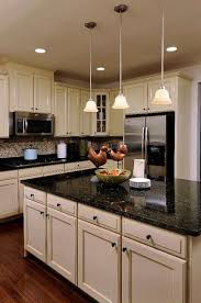 Light colored kitchen cabinets with dark countertops. 20 Stunning Light Cabinets Dark Countertops Favorite Kitchen Kitchens Kitchendesign Kit Dark Countertops Dark Kitchen Countertops Black Kitchen Countertops