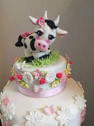 Cow Themed Baby Shower Cake Two Tiered Cake With Fondant Topper Cow Baby Shower Theme Baby Shower Cakes Baby Shower Cakes Girl