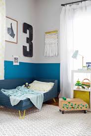 This toddler bed offers a modern frame design that will blend nicely into any child's room and transition with them as they grow. Modern Toddler Bed Diy A Beautiful Mess