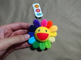 The mini plush figure comes with a pin on the back, making it perfect to attached to your backpack, jacket, or anywhere your heart desires. Takashi Murakami Flower Pin Men S Fashion Accessories On Carousell