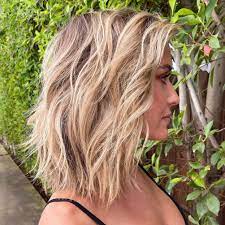 Carve the strands along the widow's peak to form a short angular fringe. These Short Layered Haircuts Are Perfect For Starting Fresh This Fall Southern Living