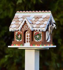 Our Adorable Candy Cottage Looks Like Christmas Decor But It S Actually A Fully Functional Birdhouse Holiday Birdhouses Fun Christmas Decorations Bird Houses