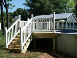 Treated Wood Deck On Girders With White Vinyl Railing Http Kennedyhomeimprovement Biz Decksandrailing Html Vinyl Deck Railing Deck Railings Deck