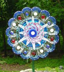 Each glass dish can take up to several minutes each to drill a hole through. Homemade Glass Garden Decorations