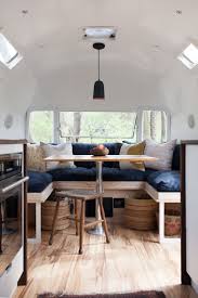 Real Women Report This Couple Quit Their Jobs To Renovate Airstreams So You Can Road Trip In Style Airstream Interior Remodeled Campers Airstream Remodel