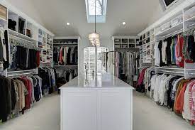 A bear of a tale. A Massive Walk In Closet With Lots Of Open Storage Showcasing The Array Of Clothes And Other Items In The Ro Closet Decor Closet Designs Walk In Closet Design