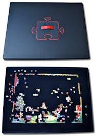 It is an indispensable piece of equipment for puzzle enthusiasts. Amazon Com Puzzle Snug Puzzle Storage For Upto 2000 Pieces Toys Games Puzzle Storage Puzzle Board Jigsaw Puzzle Board