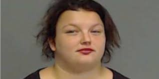 Woman charged with helping man flee the scene of Carlsbad homicide