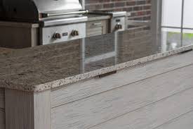 outdoor kitchen island and cabinets in