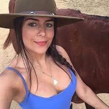 Image may contain: one or more people and hat