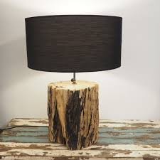I have seen several posts on pinterest for diy tree stump tables, so i read up! Rustic Wooden Tree Trunk Table Lamp Kenyon Rustic House Cornwall