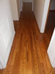 It has a very rich, pigmented color. Hallway Red Oak Minwax Early American Satin Finish Red Oak Floors Hardwood Floors Red Oak Hardwood Floors