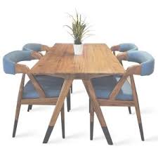 Crafted of solid mango wood, the coffee table imparts a rustic feel while its sleek, simple silhouette and rustic black stained finish lend a modern look. Coffee Table Informa Archives Viku Furniture Bandung